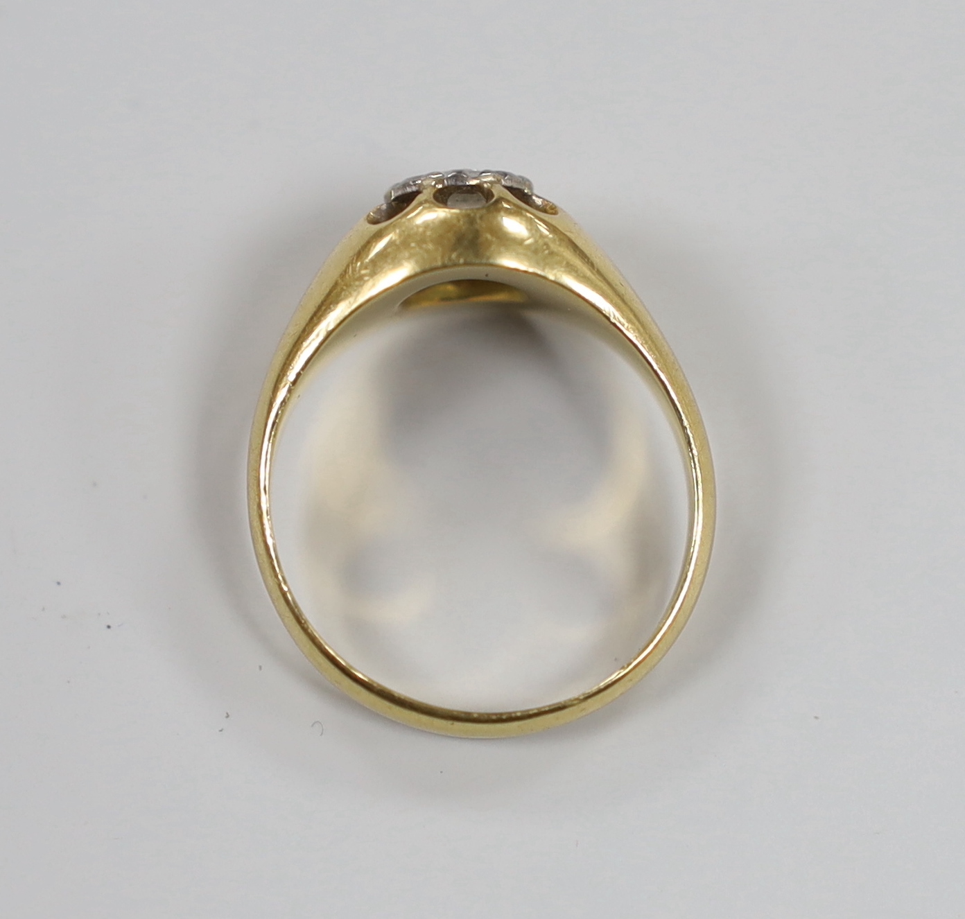 An 18ct illusion and claw set solitaire diamond ring, size Q/R, gross weight 8 grams.